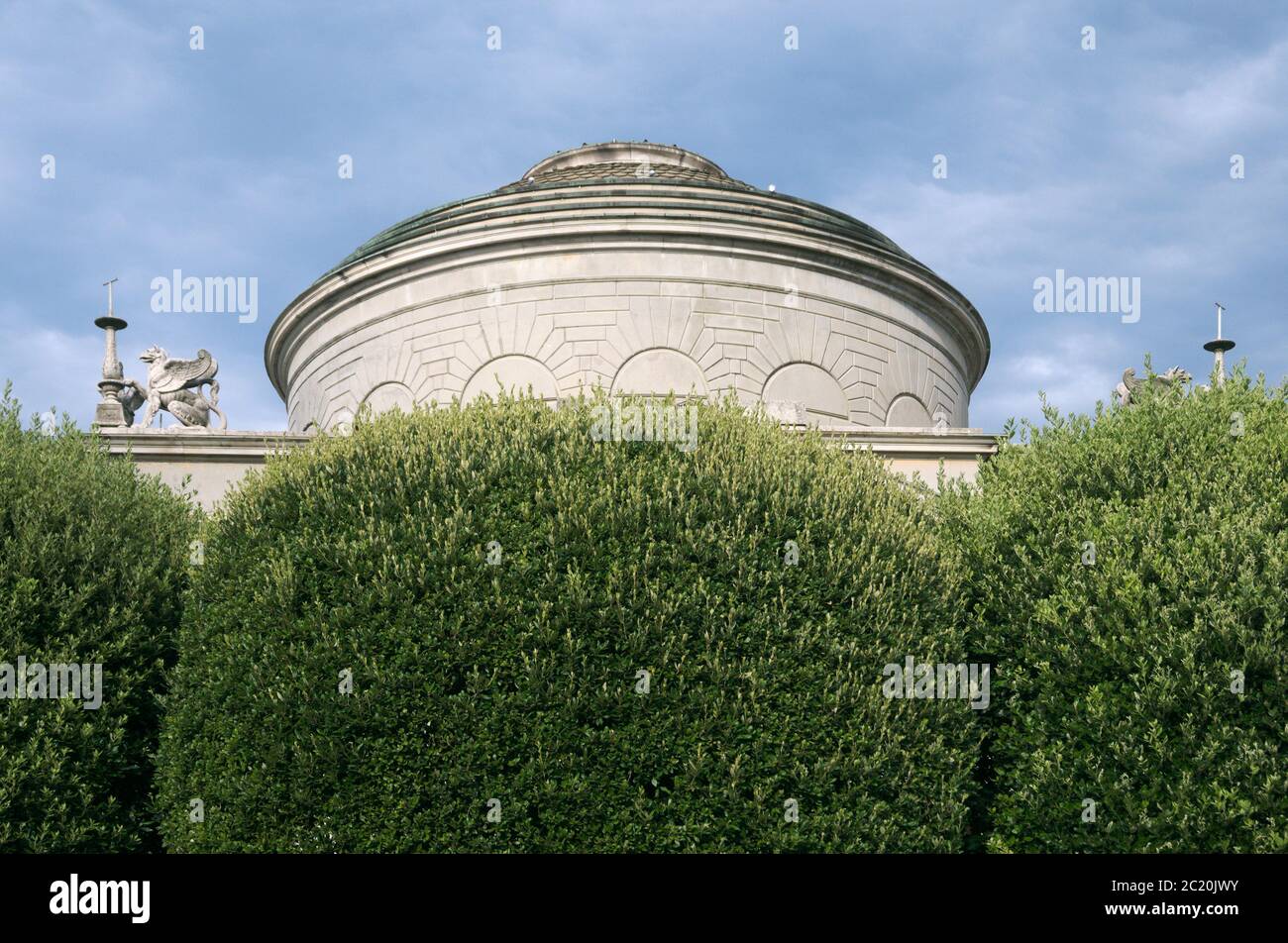 Tempio Voltiano museum behind hedges, Como, Italy Stock Photo