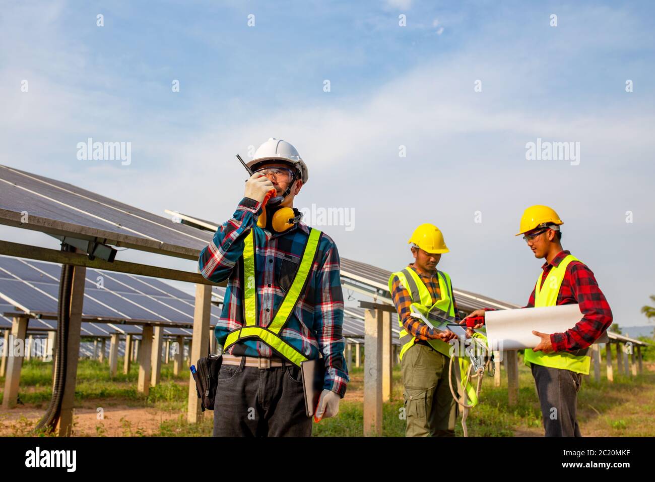 The electrician engineering working in the solar cell farm Stock Photo