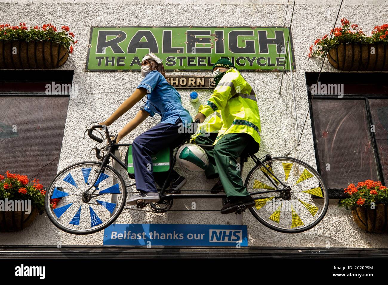 Tandem bike on wall opposite duke york bar hires stock photography and