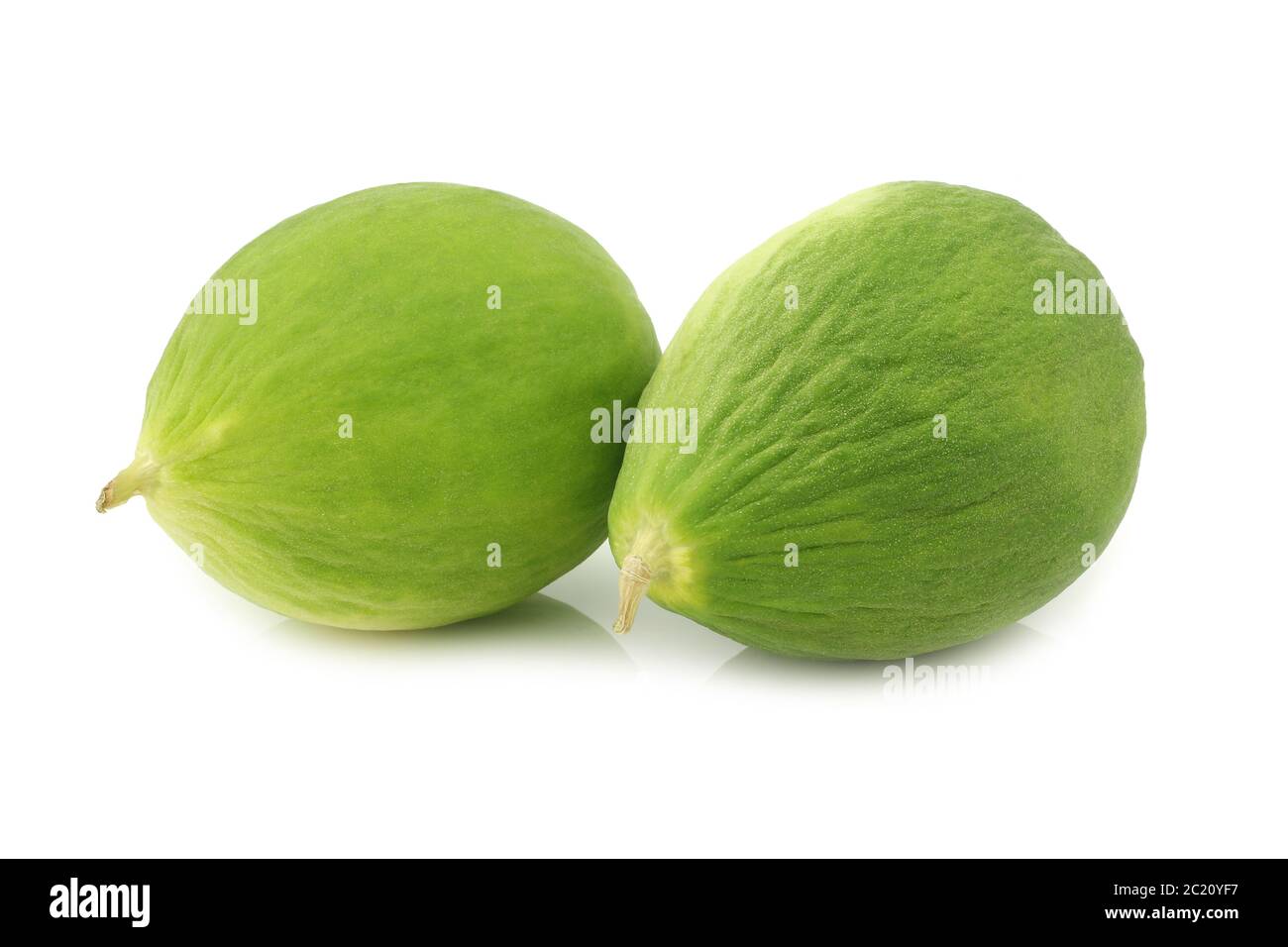 fresh cumelo's (mix between a cucumber and a melon) on a white background Stock Photo