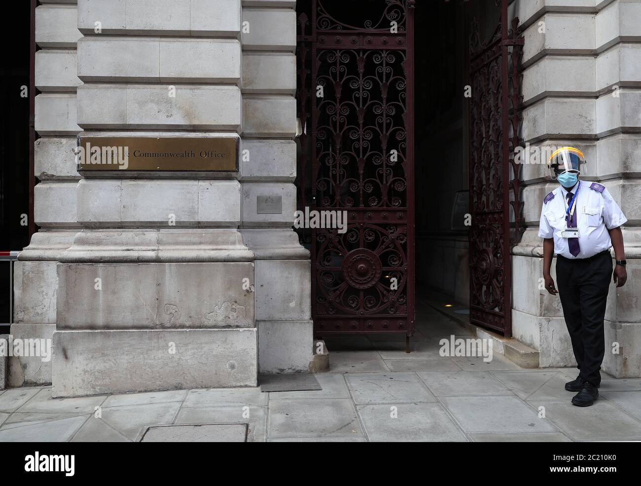 An entrance of the Foreign & Commonwealth Office in Whitehall, London. Prime Minister Boris Johnson has announced that he has merged the Department for International Development (Dfid) with the Foreign Office, creating a new department, the Foreign Commonwealth and Development Office. Stock Photo