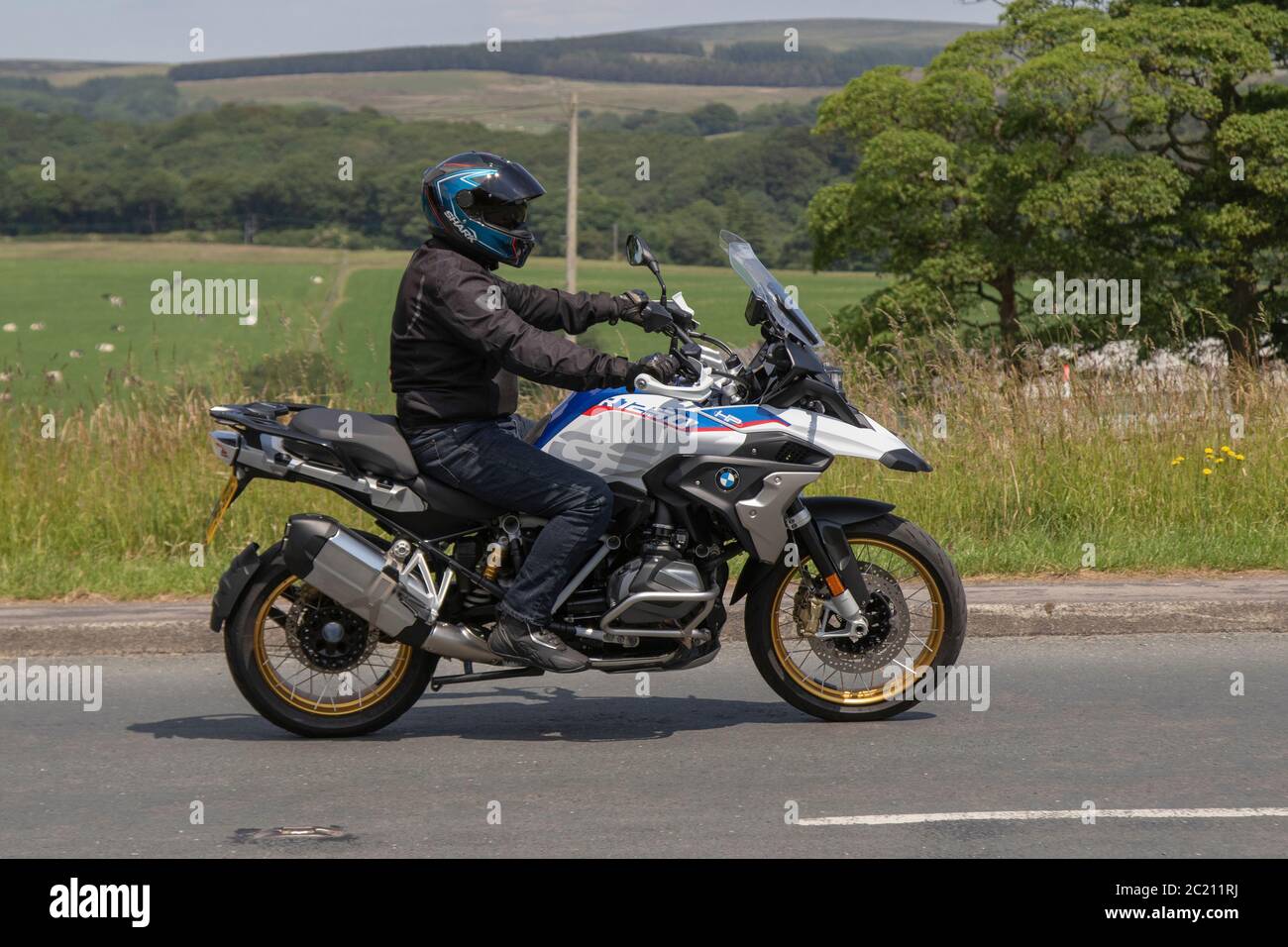 https://c8.alamy.com/comp/2C211RJ/bmw-r-1250-gs-rallye-te-motorbike-rider-two-wheeled-transport-motorcycles-vehicle-roads-motorbikes-bike-riders-motoring-in-chorley-uk-2C211RJ.jpg