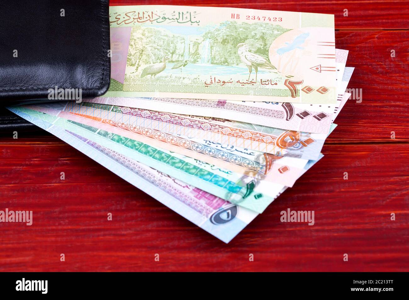 Sudanese Pounds in the black wallet Stock Photo