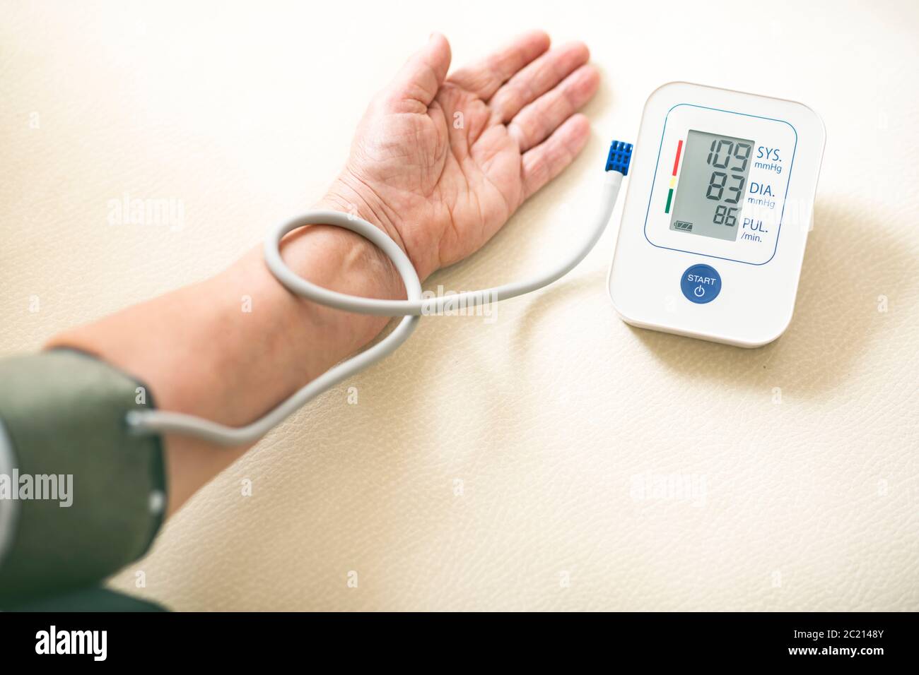 Blood pressure test with digital monitor Stock Photo