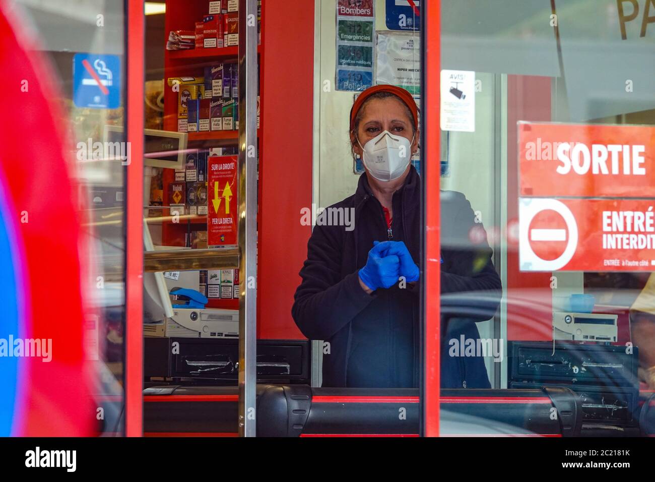 Shoppers wearing protective face masks, in Pas de la Casa, Andorra Stock Photo