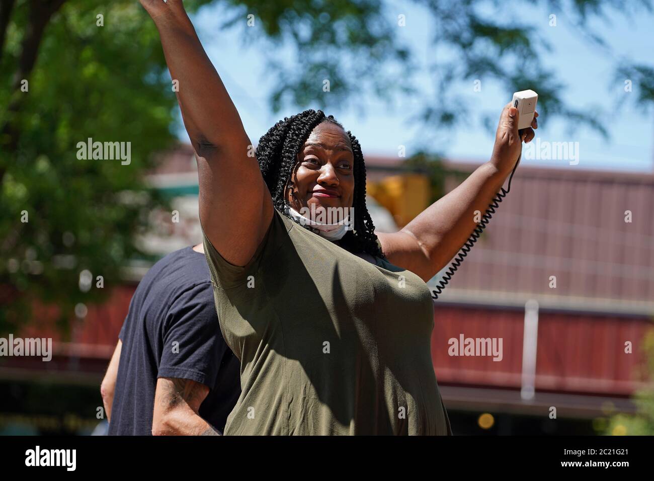 Shonta Ford, a small business owner in Wescosville, speaks to community members June 14, 2020, during a peace march in Emmaus, Pennsylvania. Stock Photo