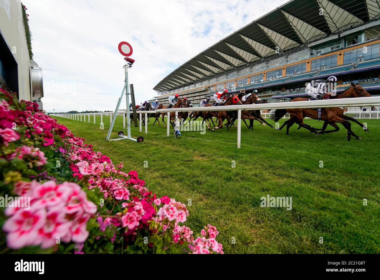 A general view as runners in The Ascot Stakes pass the winning post with a circuit to go during day one of Royal Ascot at Ascot Racecourse. Stock Photo
