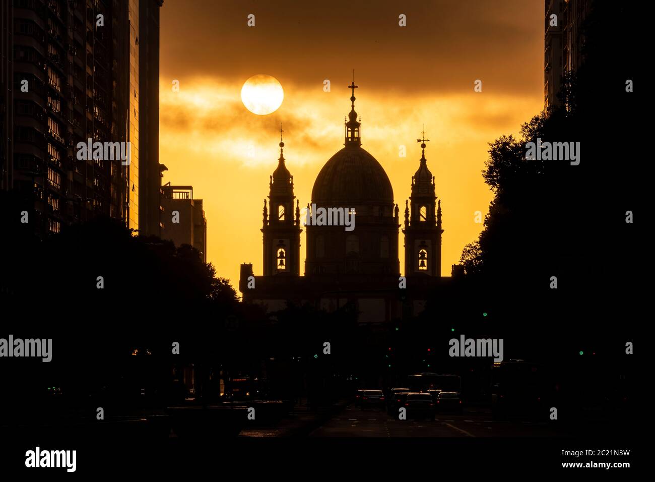 Beautiful view to historic church building during sunrise downtown Stock Photo