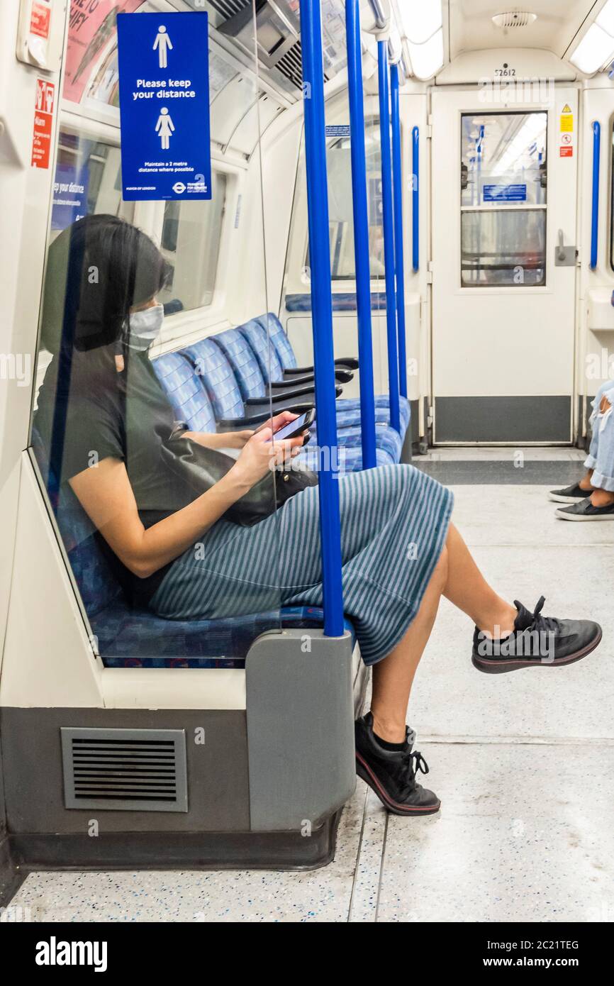 London, UK. 16th June, 2020. Passenger numbers remain dramatically down on the tube. Those who do travel nearly all wear masks after they become mandatory on public transport. The 'lockdown' continues for the Coronavirus (Covid 19) outbreak in London. Credit: Guy Bell/Alamy Live News Stock Photo