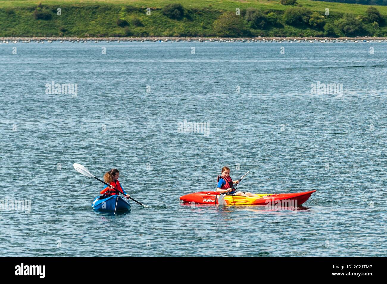 Bantry, West Cork, Ireland. 16th June, 2020. Kids enjoy the Bantry Bay Boat  Hire Summer Kayaking School on a day of sunshine in Bantry. Credit: AG  News/Alamy Live News Stock Photo -