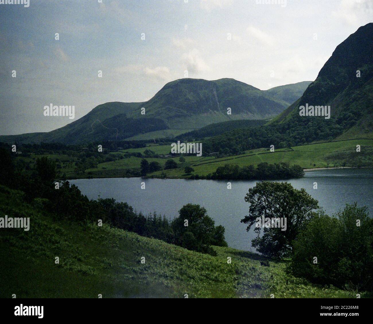 Crummock Water Rolling Green Hills And Lake Lake Yorkshire Dales Natural Lighting Landscape Unfiltered Stock Photo Alamy