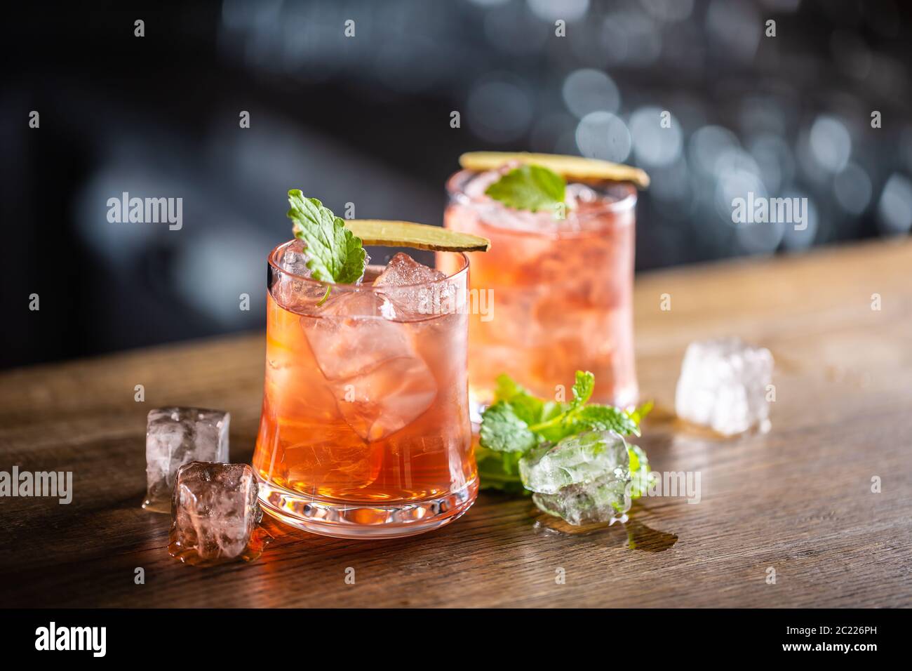 Sea breeze cocktail with ice and fresh mint, on a dark background Stock Photo