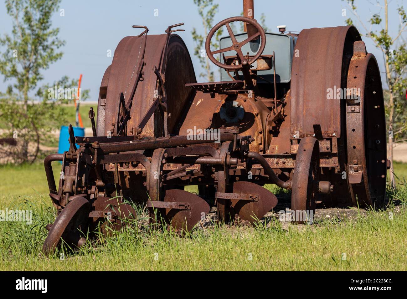 old and history tractor in a field Stock Photo - Alamy