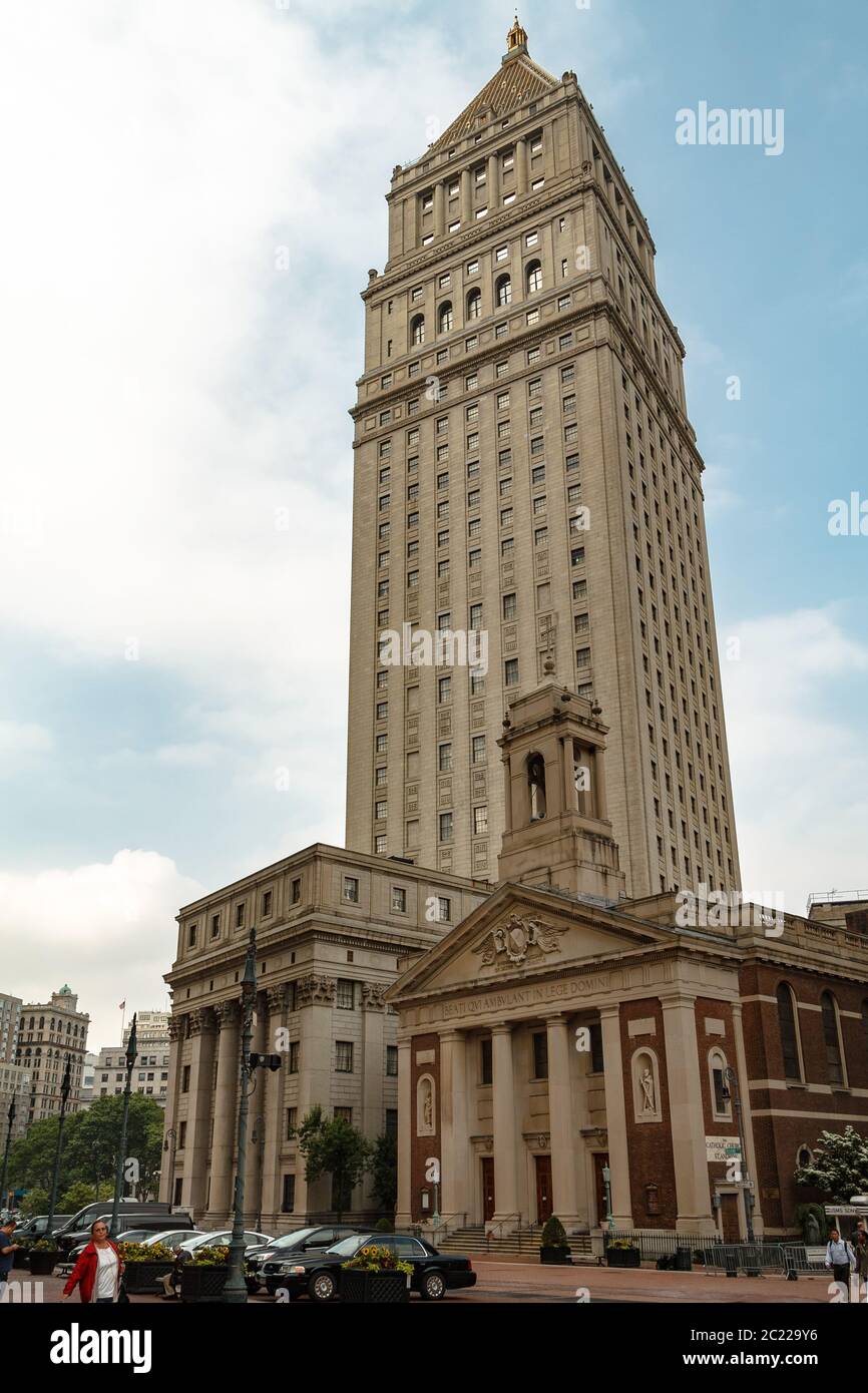 St Andrew's Catholic Church and the tower of the Thurgood Marshall United States Courthouse Stock Photo
