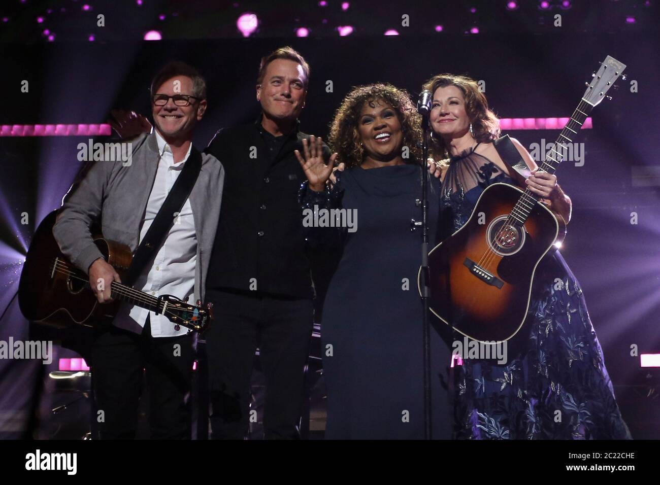 NASHVILLE, TN - OCTOBER 15: Steven Curtis Chapman, Michael W. Smith, CeCe Winans and Amy Grant during the 50th Annual Gospel Music Association Dove Aw Stock Photo