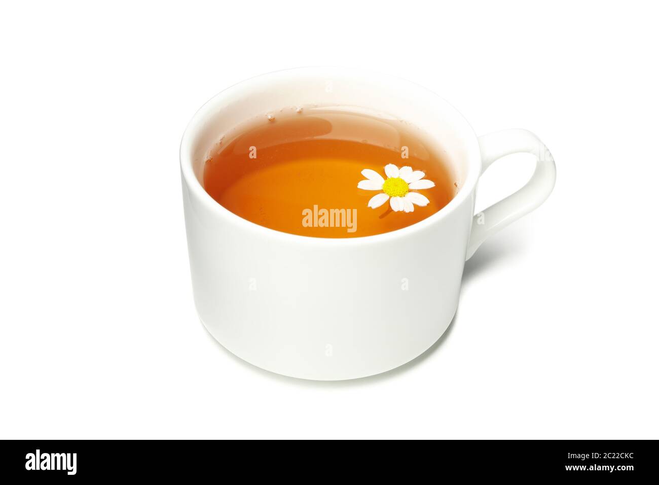 Cup of chamomile tea isolated on white background Stock Photo - Alamy
