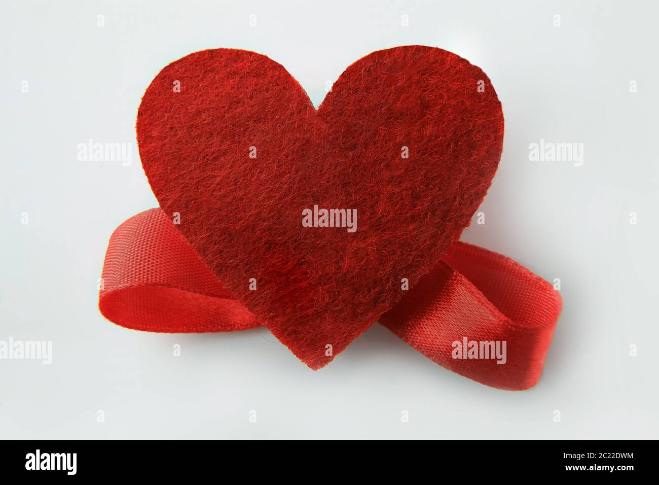 Heart with red ribbon isolated on white background Stock Photo - Alamy