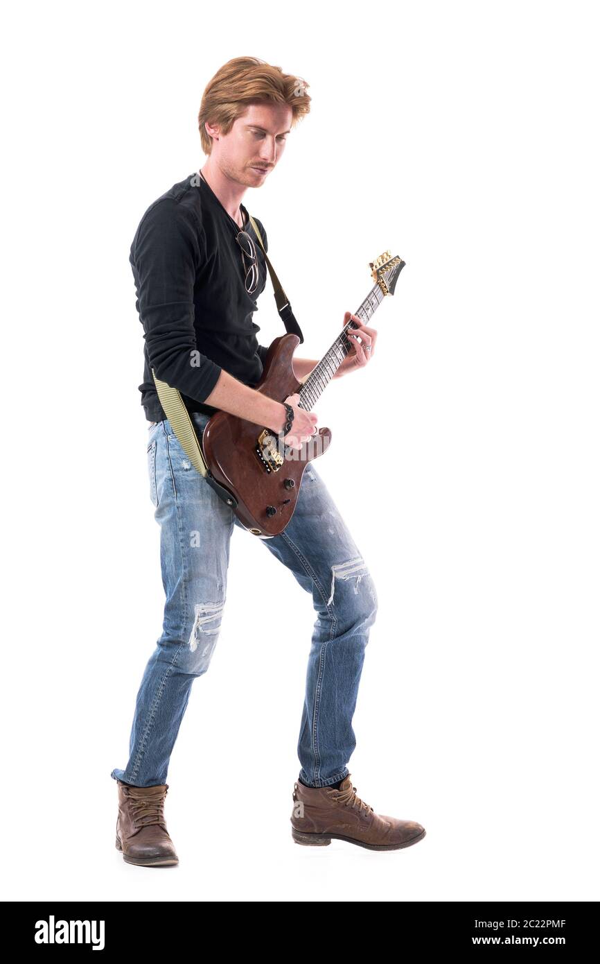 Young Punk Rocker Playing Electric Guitar Stock Photo - Download