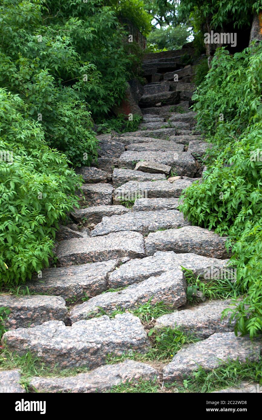 Narrow Path Rocks Narrow trekking pavement laid with rock-cut slabs at Ramagiri near ...