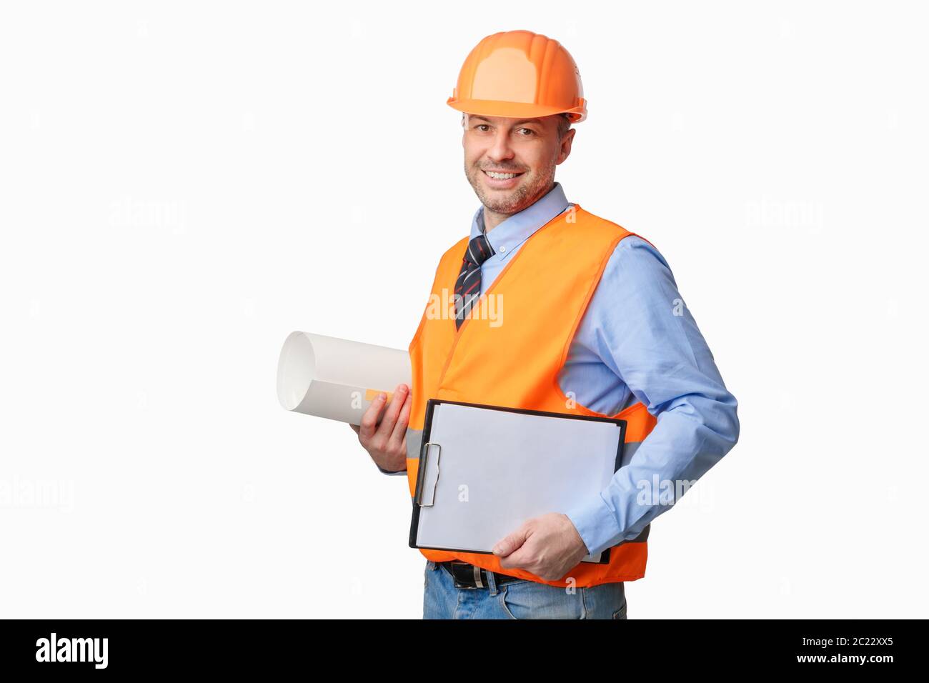 Architect Holding Building Plan Papers Standing On White Background Stock Photo