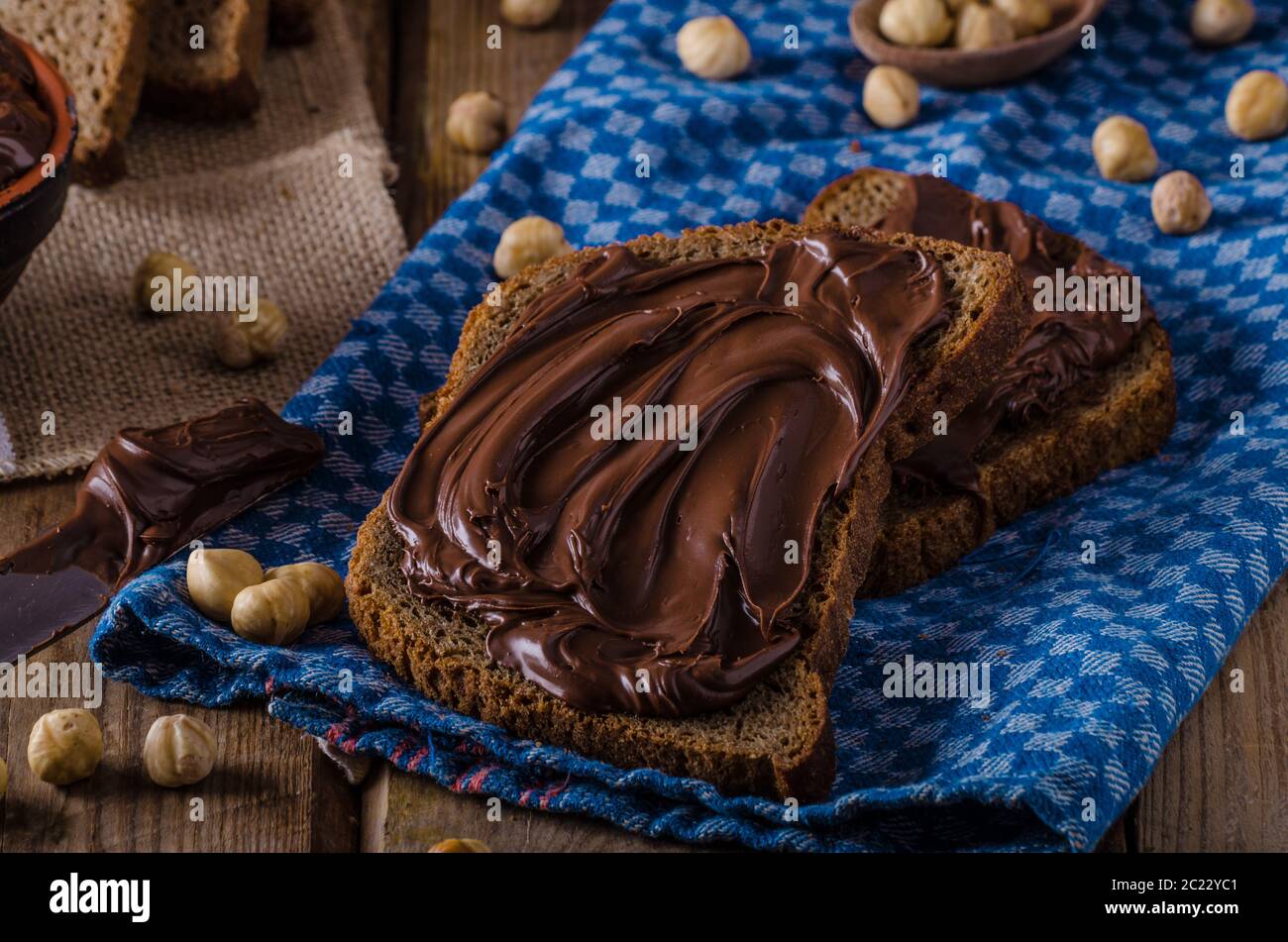Homemade hazelnut spread on whole grain bread heathy Stock Photo Alamy