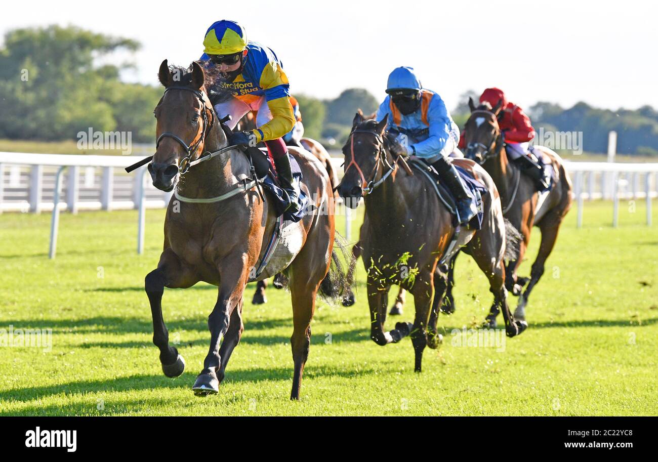 Chairmanoftheboard ridden by jockey Rob Hornby wins the Highclere Thoroughbred Racing Handicap at Windsor Racecourse. Stock Photo
