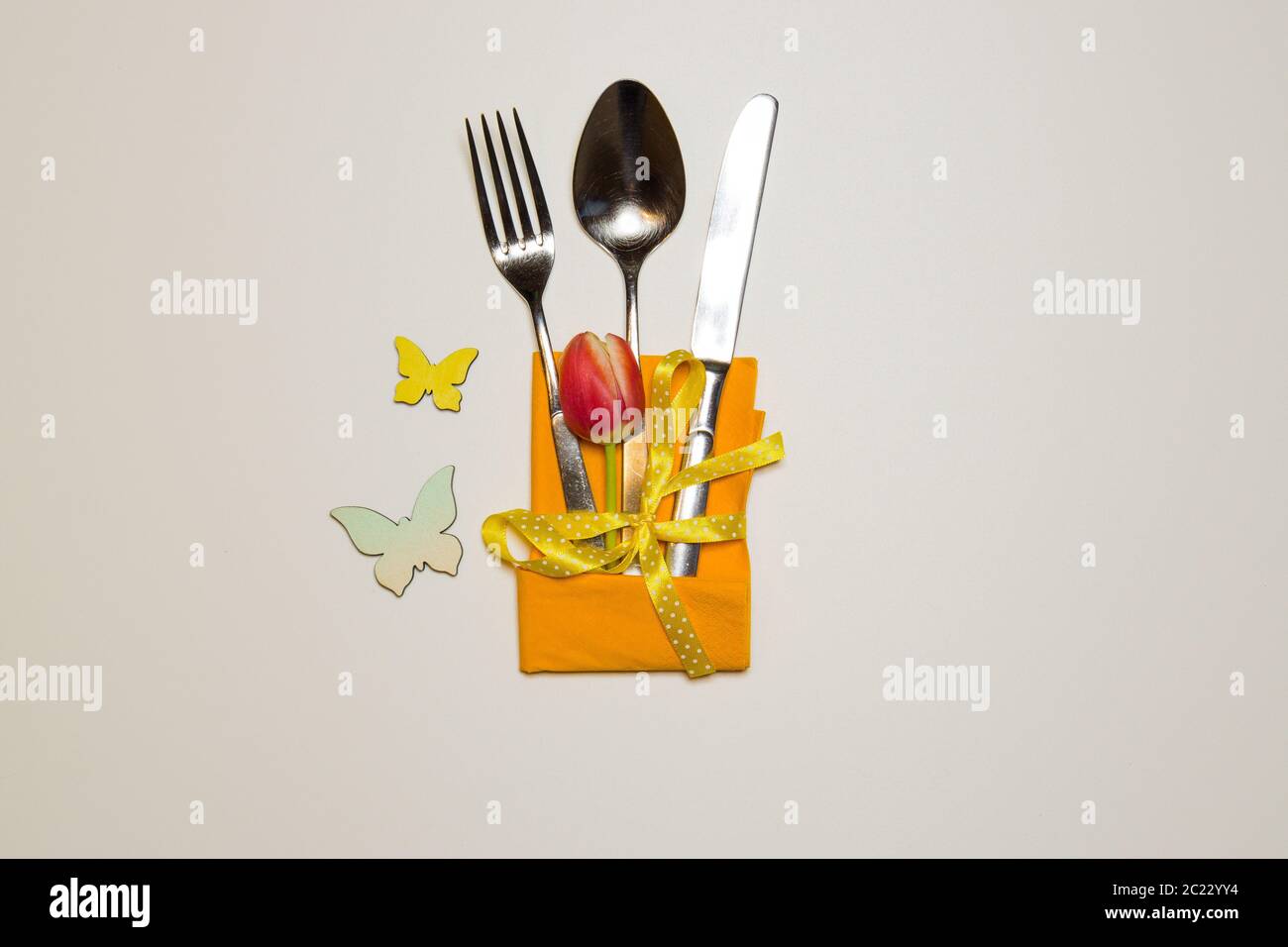 springlike Easter cutlery sets Stock Photo