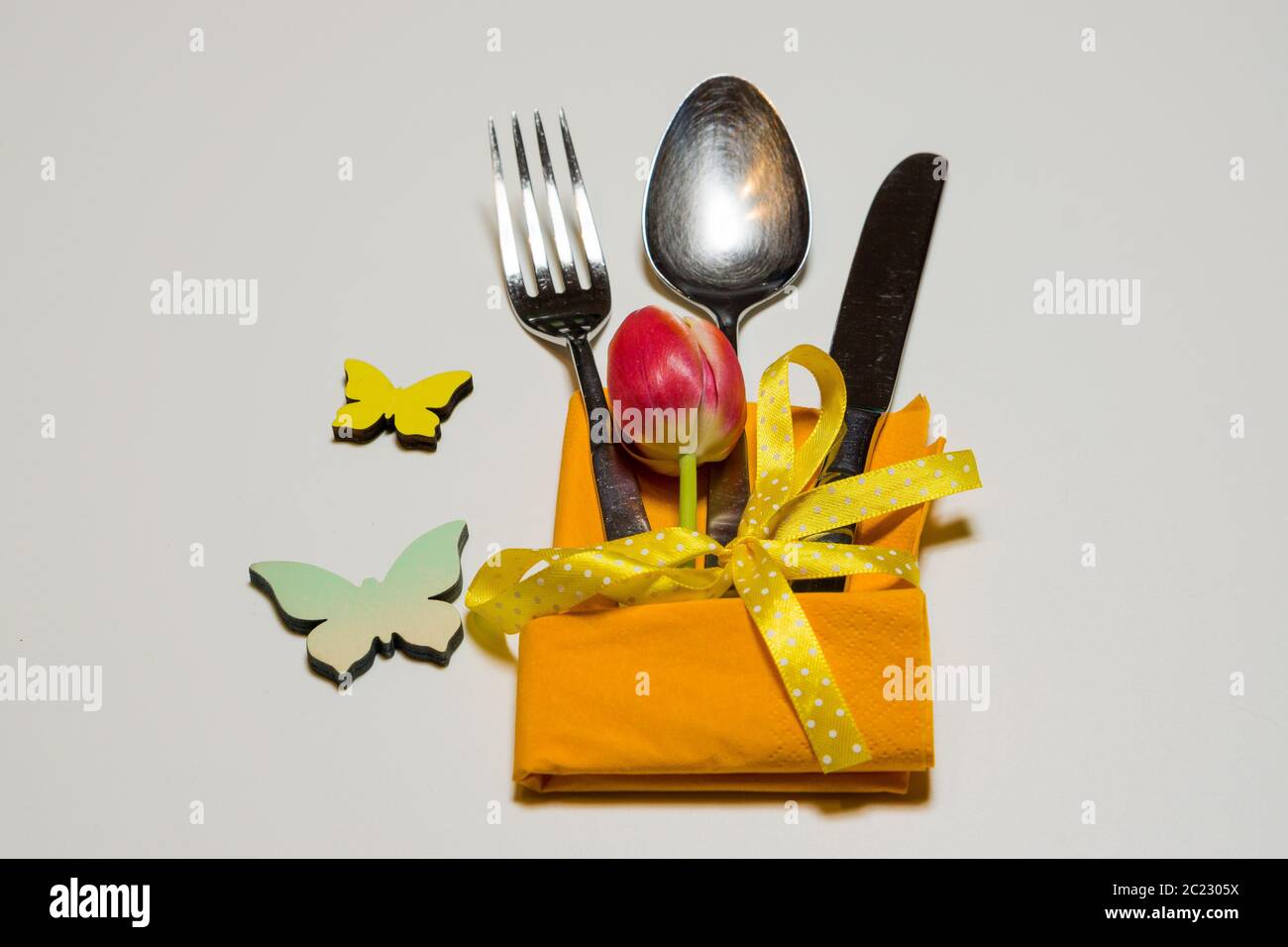 Springlike Easter cutlery sets Stock Photo Alamy
