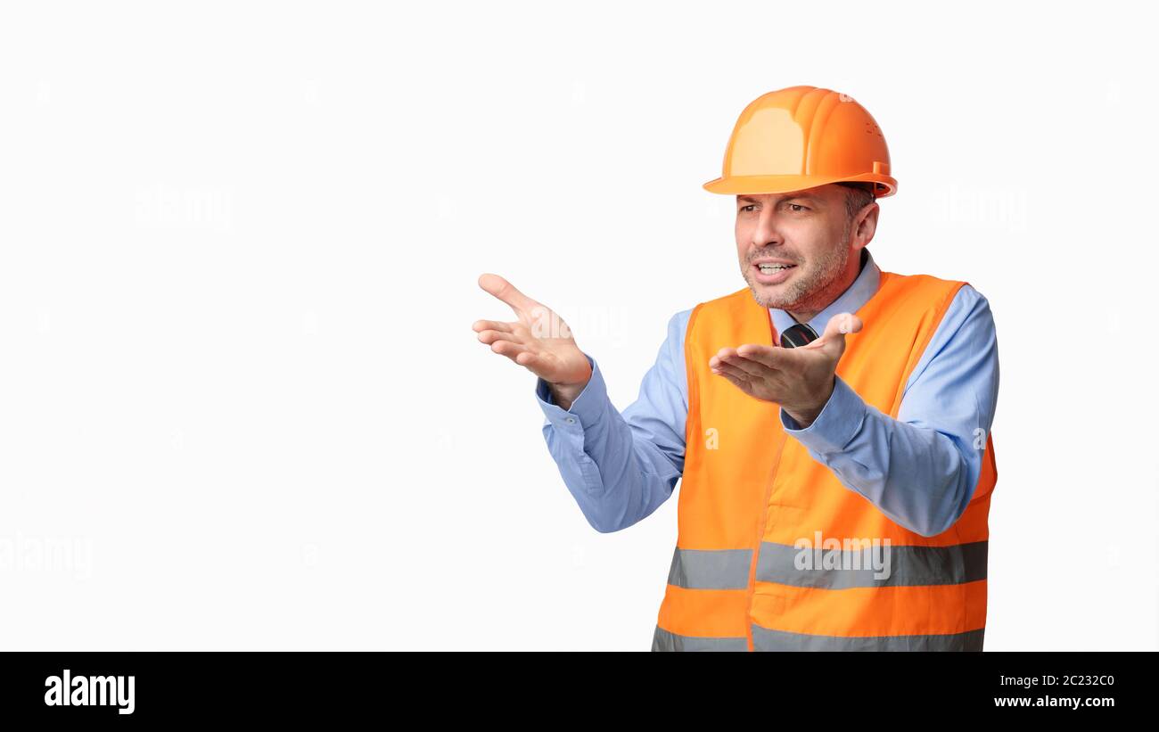 Discontented Construction Worker Gesturing Posing On White Background, Panorama Stock Photo