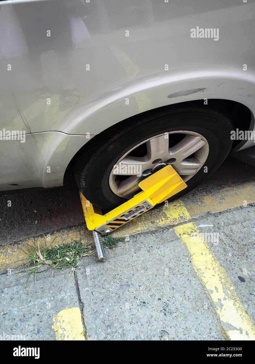 Parking claw on the car Stock Photo
