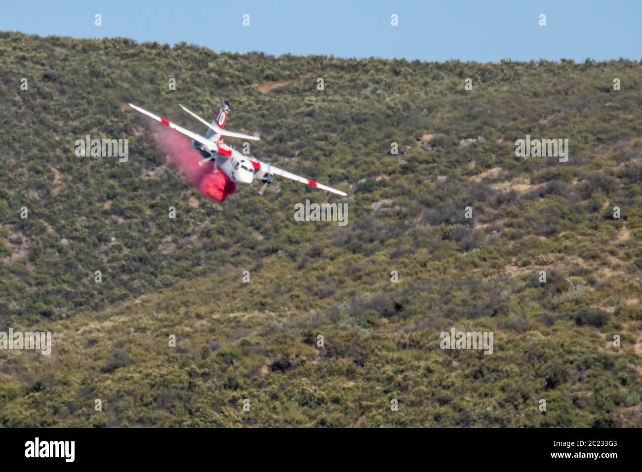 Winchester, CA USA June 14, 2020 Cal Fire aircraft drops fire