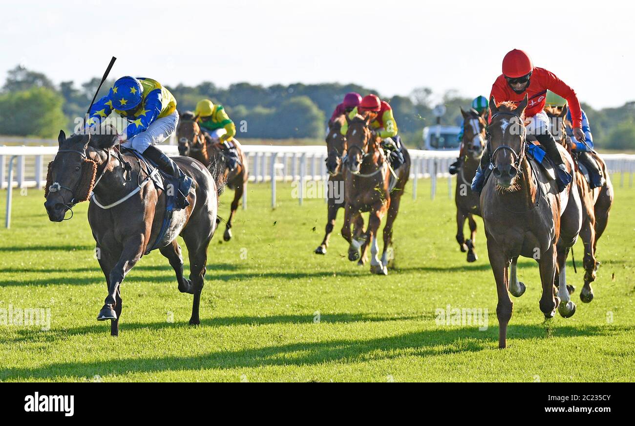 Lethal Missile ridden by jockey Hector Crouch wins the Martin Keighley Racing Partnerships Handicap at Windsor Racecourse. Stock Photo