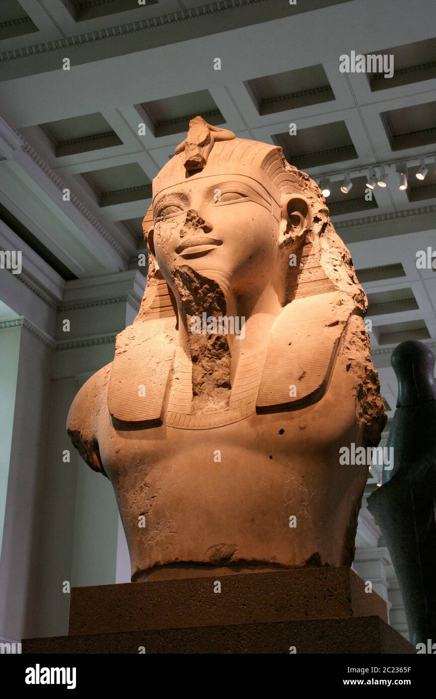 London, United Kingdom - SEP 19, 2010: the remainings of an old statue of King Amenhotep III from ancient Egypt. 1370 BC. Stock Photo