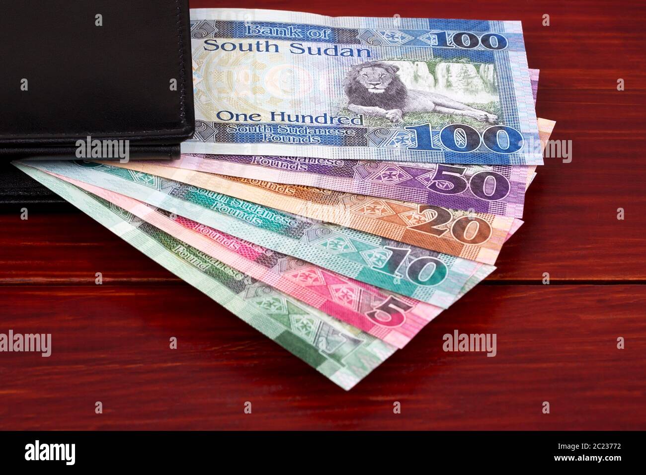 South Sudanese Pounds in the black wallet Stock Photo