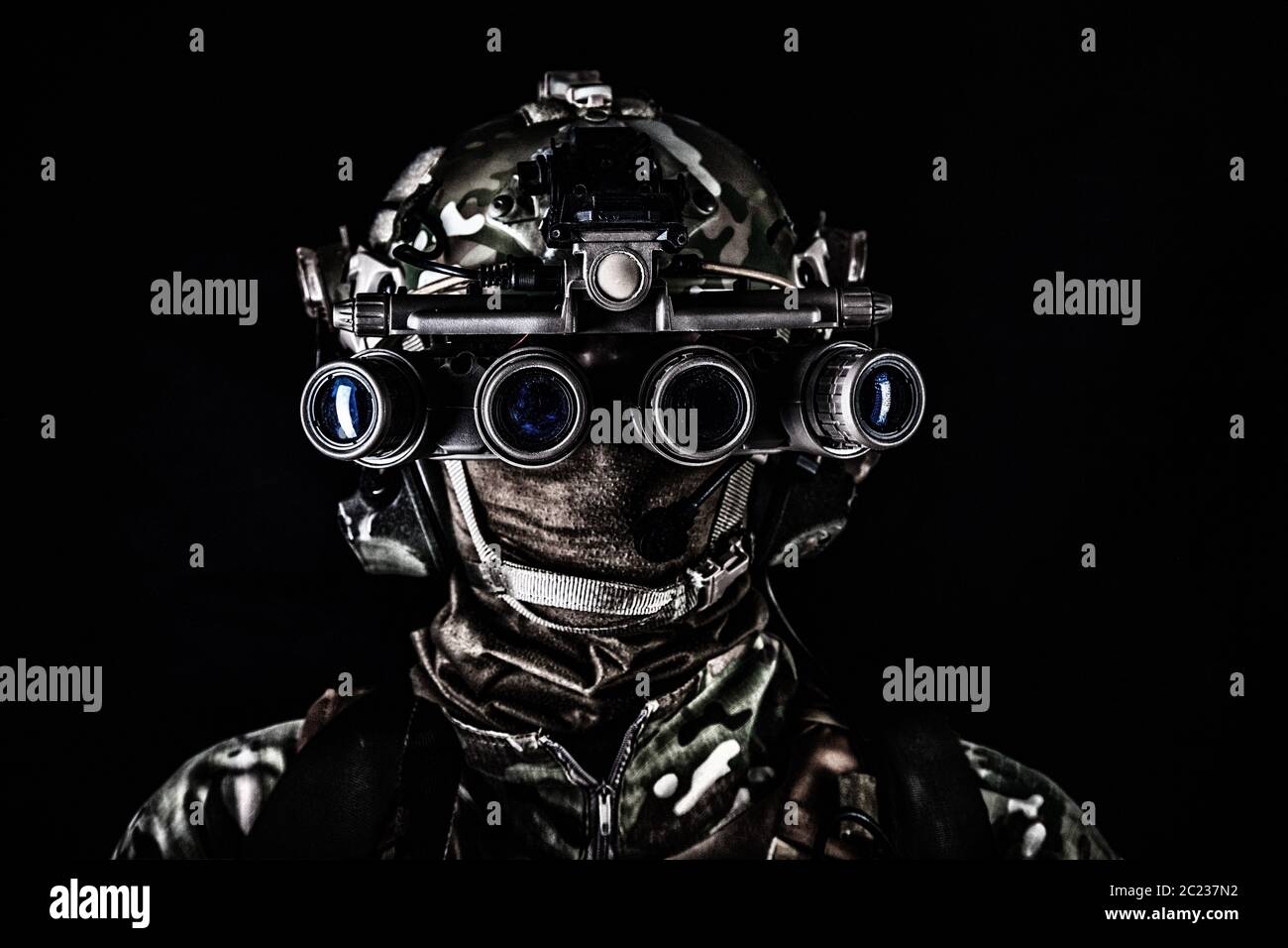 Modern army special forces soldier, anti terrorist squad fighter, elite  commando warrior wearing mask, using four lenses night vision goggles in  low l Stock Photo - Alamy
