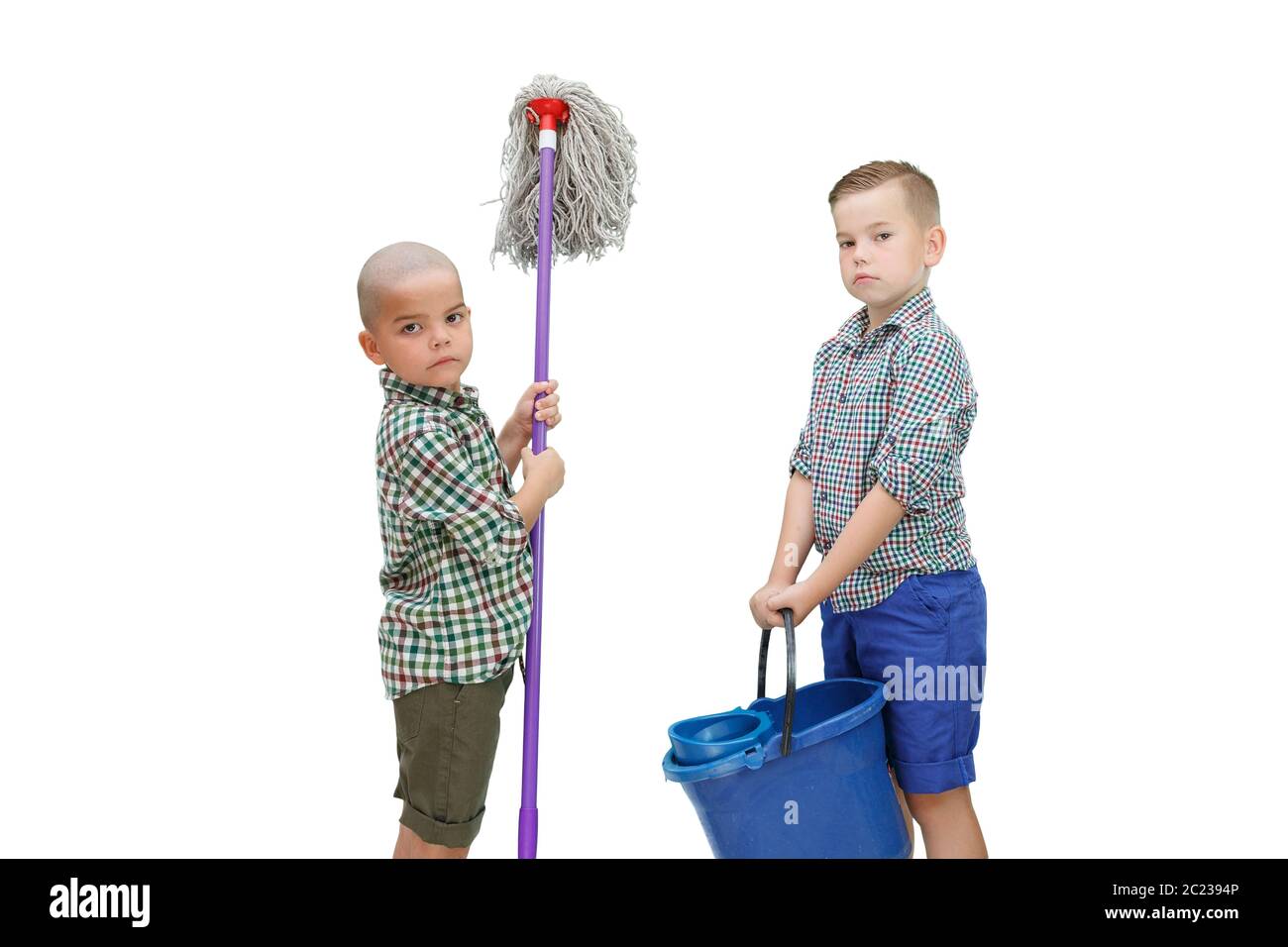 https://c8.alamy.com/comp/2C2394P/two-caucasian-boy-standing-on-a-white-isolated-background-and-holding-a-bucket-of-water-and-a-mop-for-cleaning-2C2394P.jpg