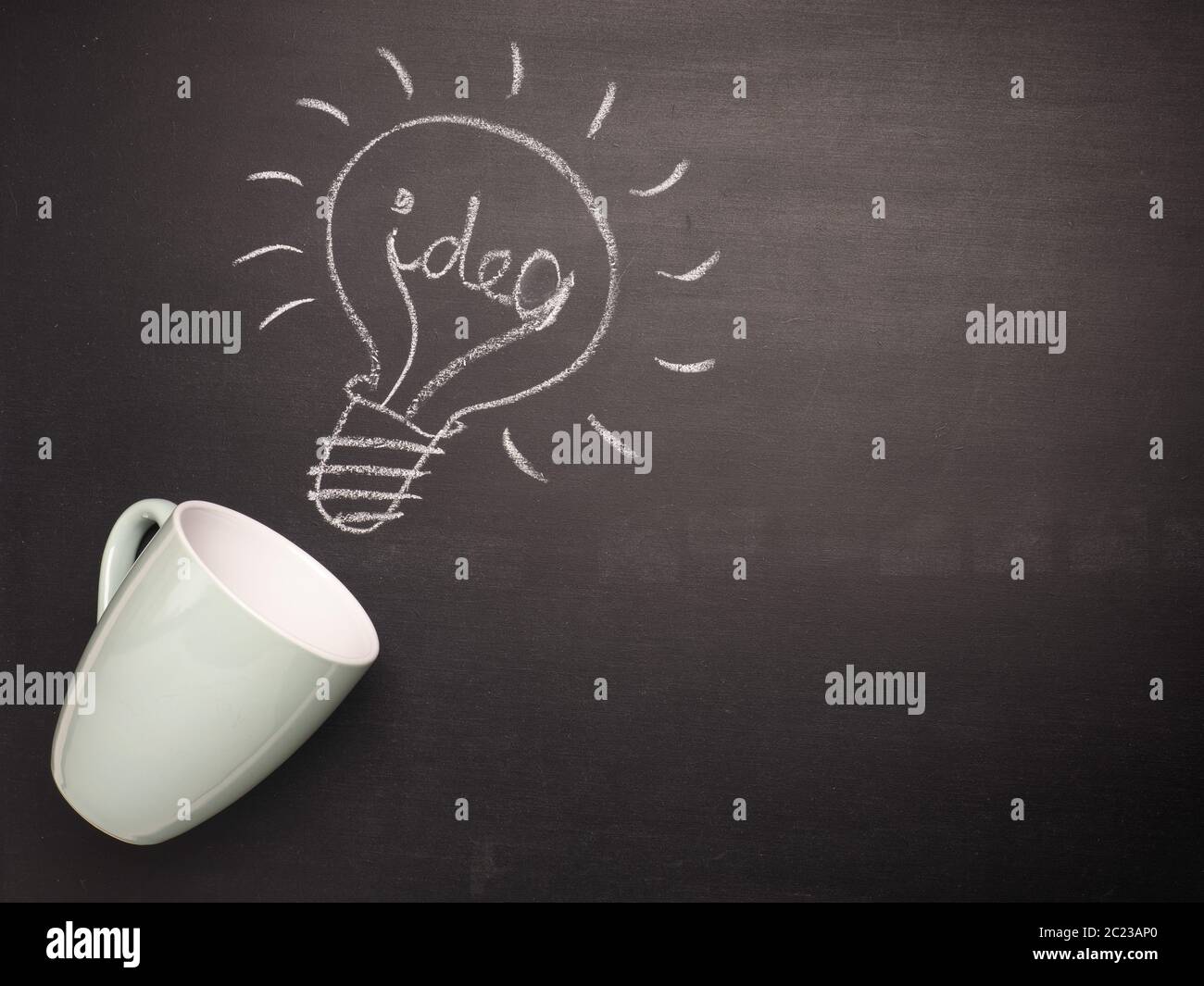 Coffee cup with a light bulb on a chalkboard, great idea concept Stock Photo