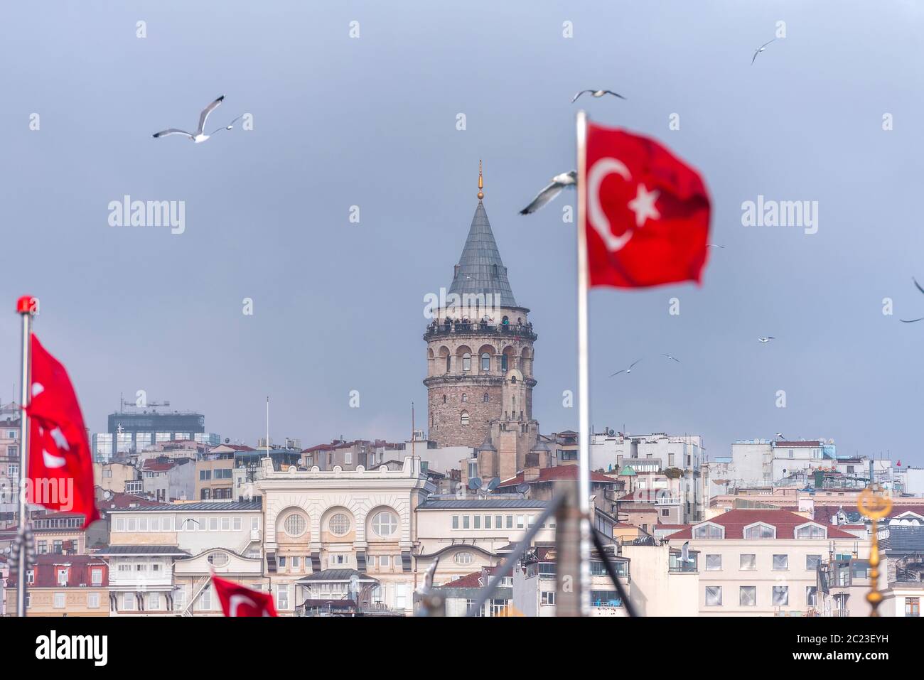 Istanbul, Galata tower and red Turkish flag, Turkey Stock Photo