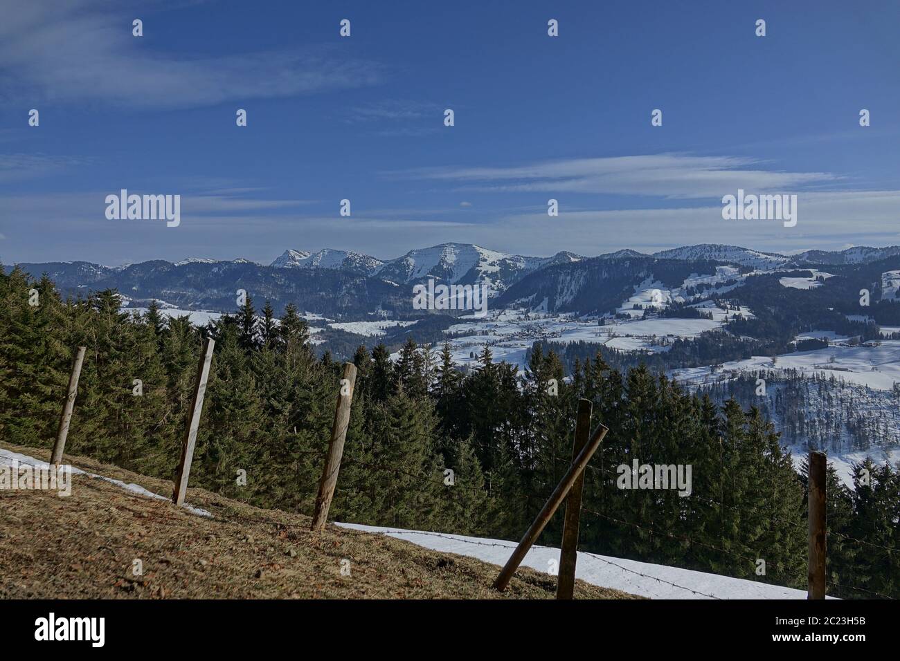 View to the mountains of the Nagelfluhkette in wintery AllgÃ¤u Stock Photo