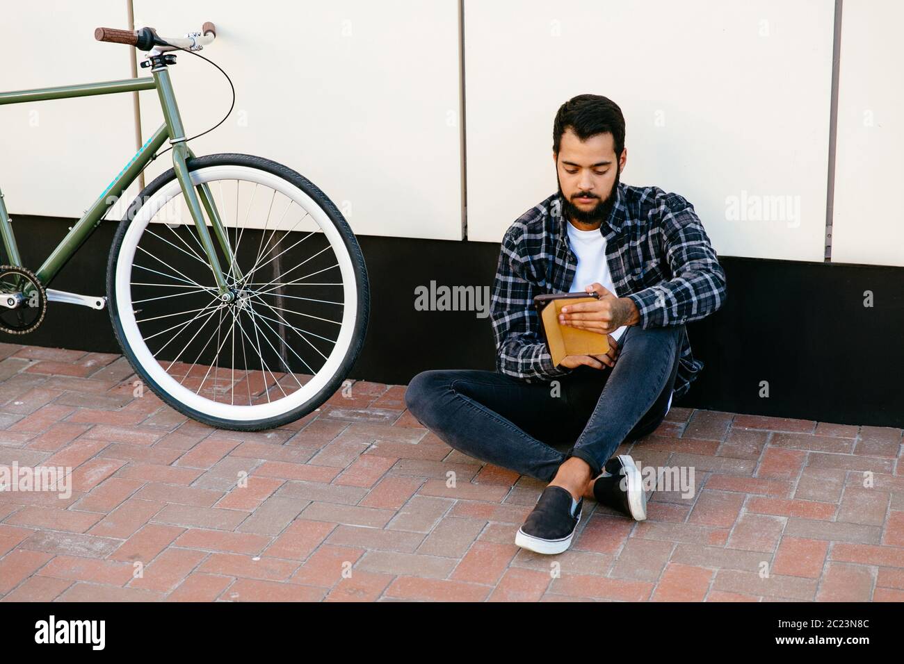 Pensive arab man sitting hi-res stock photography and images - Alamy