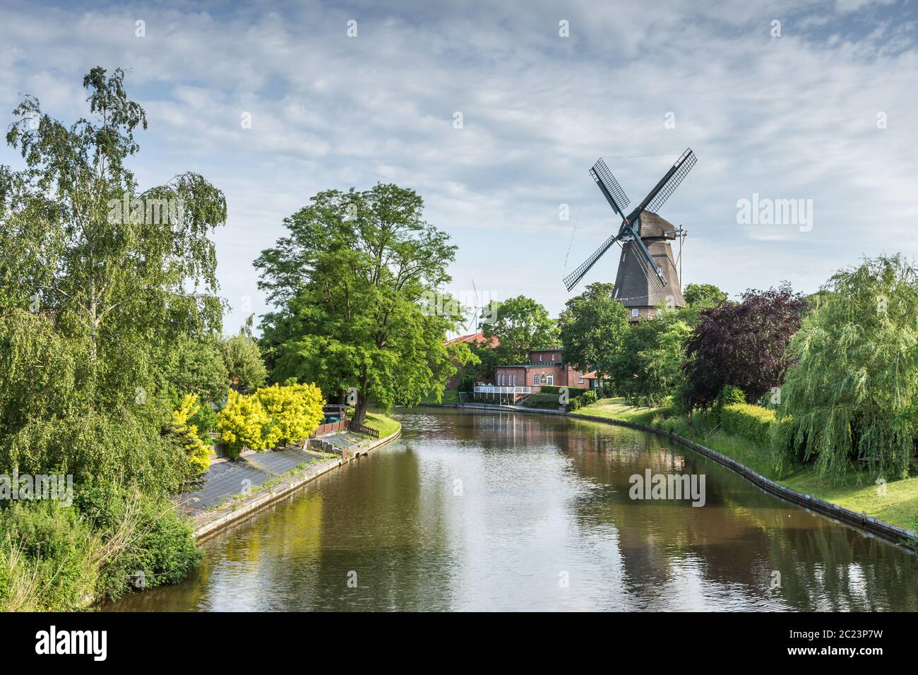Three-story Smock Mill at the Lower Saxon Mill Road, East Frisia, Germany Stock Photo