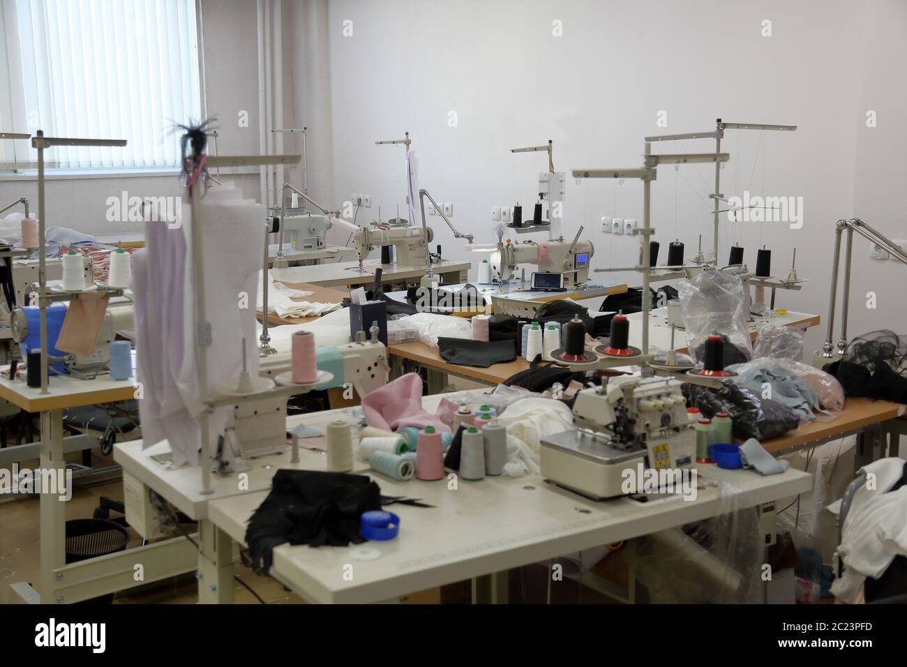 A small for sewing clothes with professional equipment and