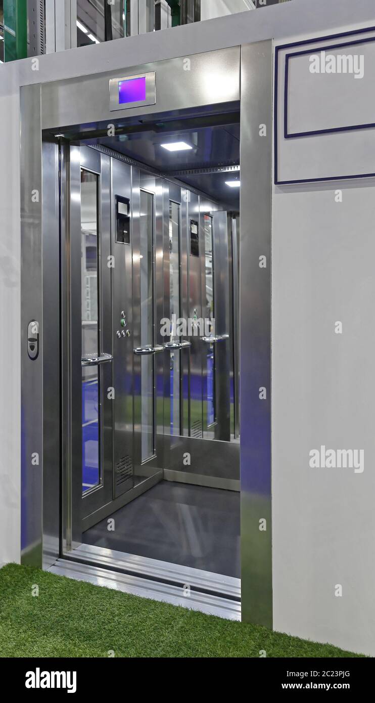 Stainless Steel Modern Elevator Lift Cabin With Glass Stock Photo - Alamy