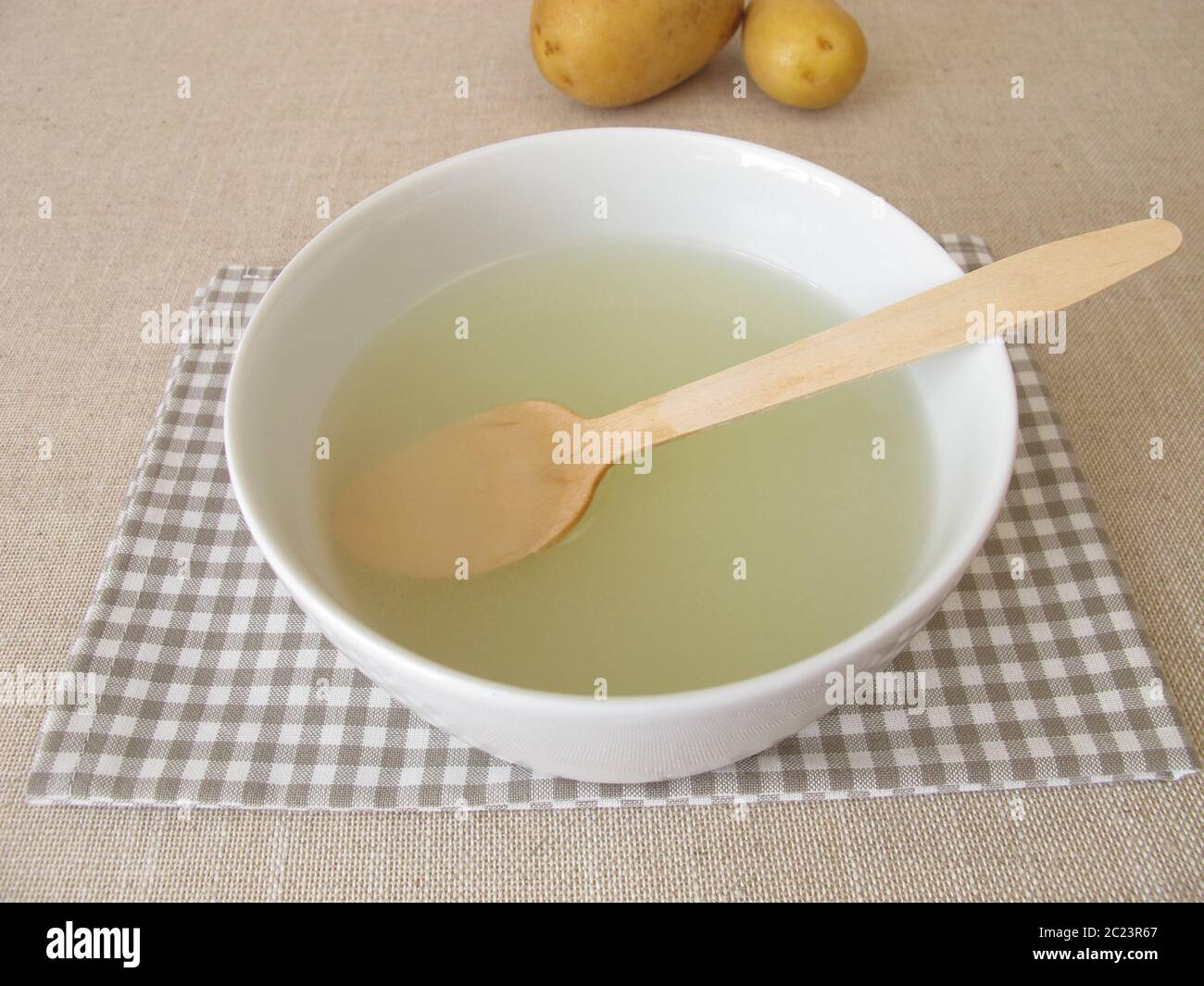 Dumpling broth, murky cooking water from potato dumplings Stock Photo