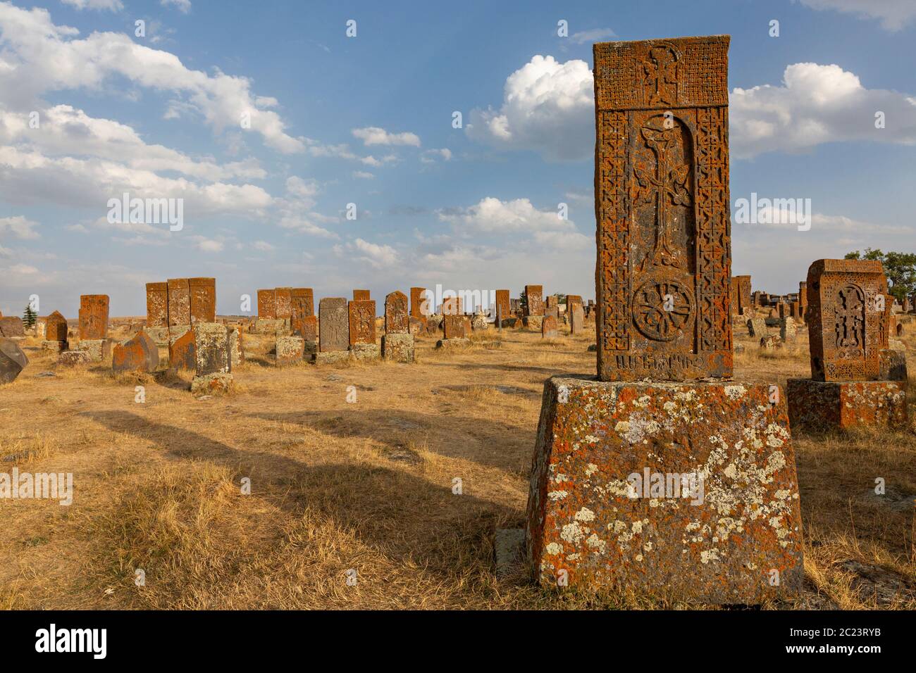 Ancient tombs and headstones known as Khachkar, in the historical cemetery of Noratus in Armenia. Stock Photo