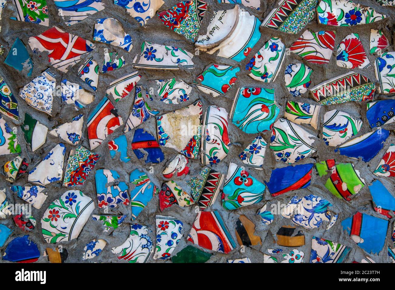 Broken plate colorful debris mosaic background, abstract art design of