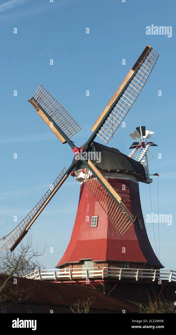 Windmill,miller,grinding grain Stock Photo