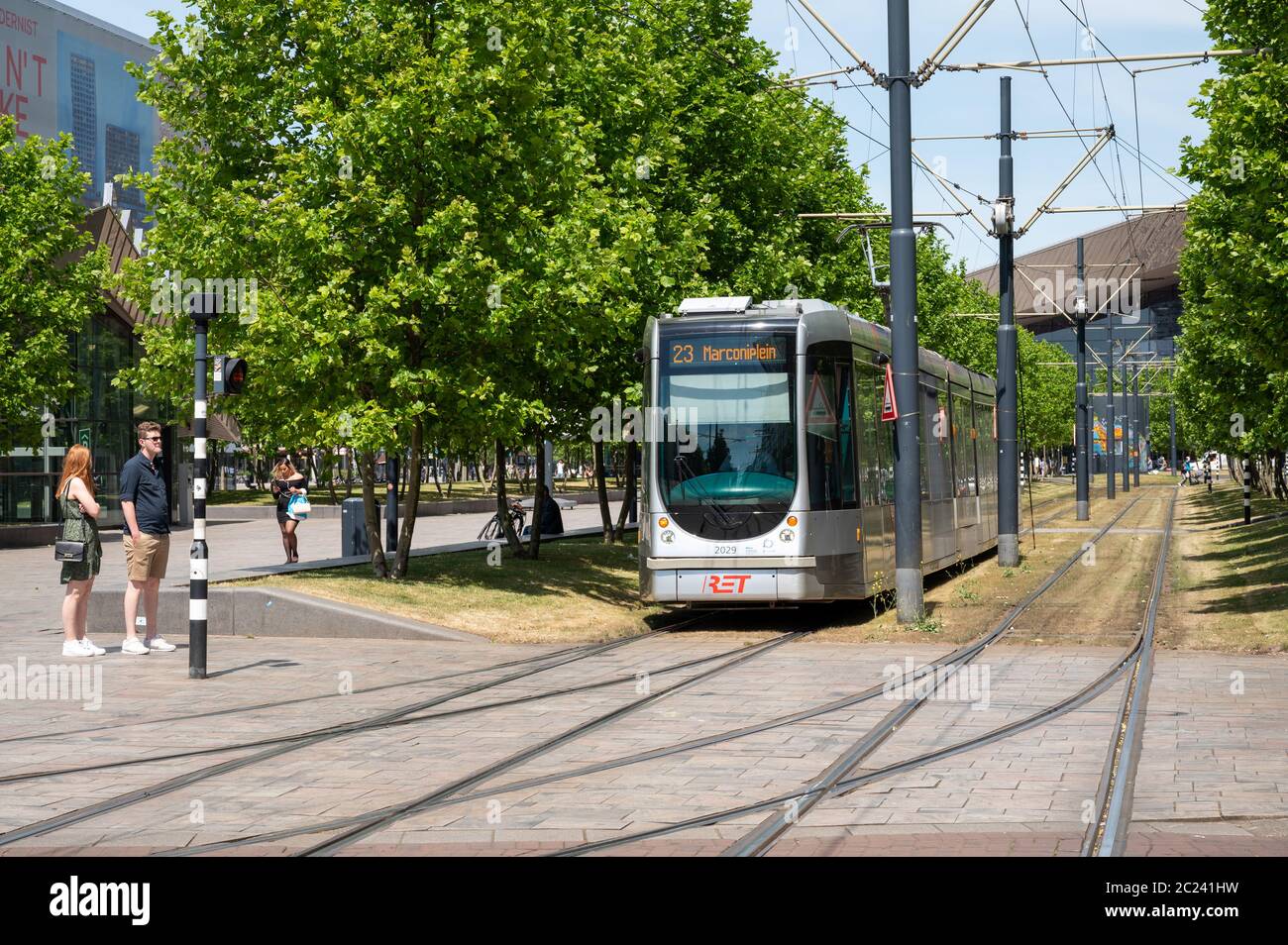 Tram on Kruisplein in the centre of Rotterdam, Netherlands. People visible. Stock Photo