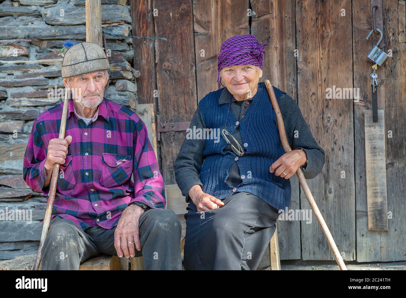 Elderly Georgian couple in the Caucasus Mountains, in Ushguli, Georgia. Stock Photo