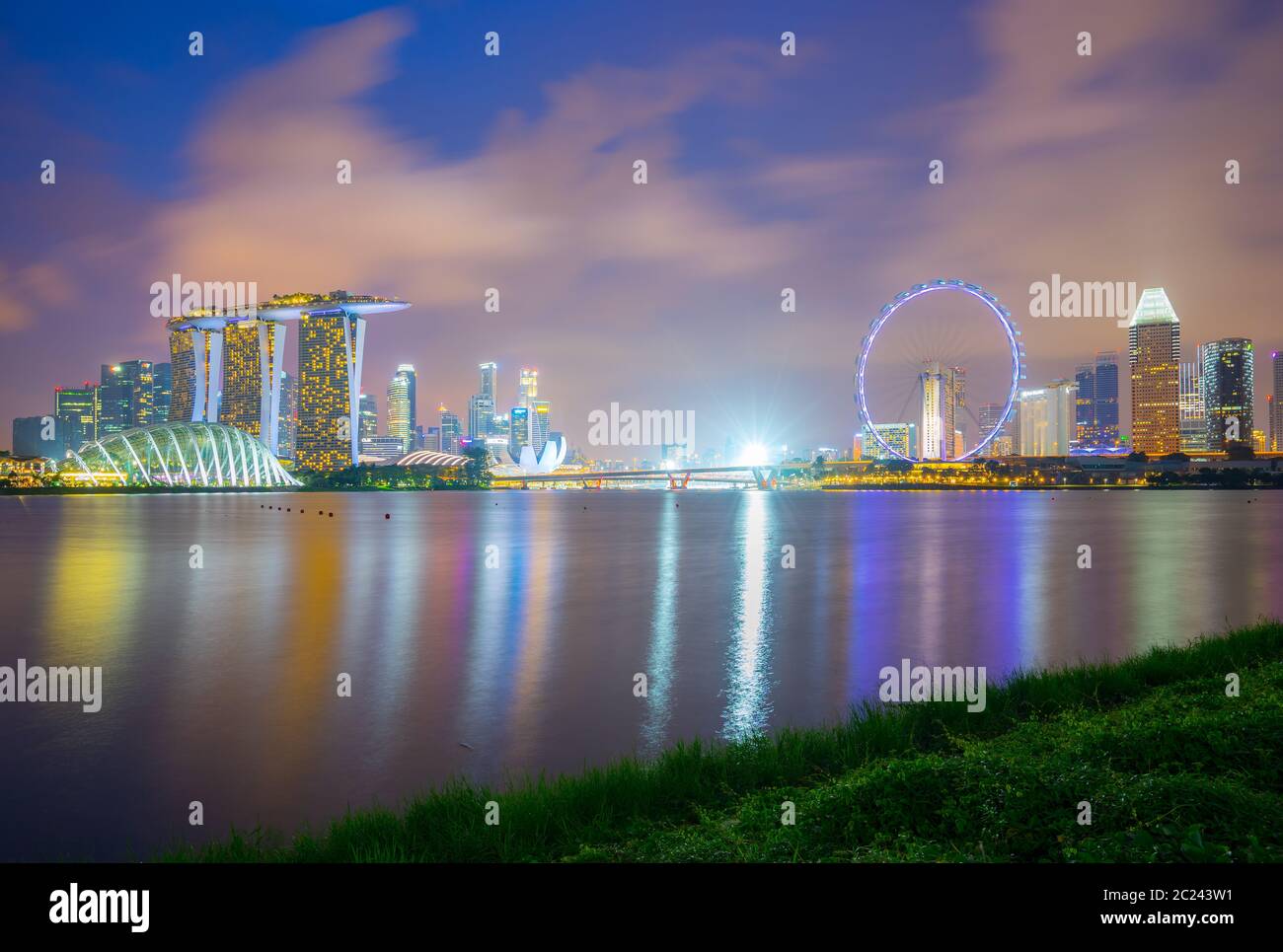 Singapore city skyline at night view from Marina Barrage in Singapore city Stock Photo